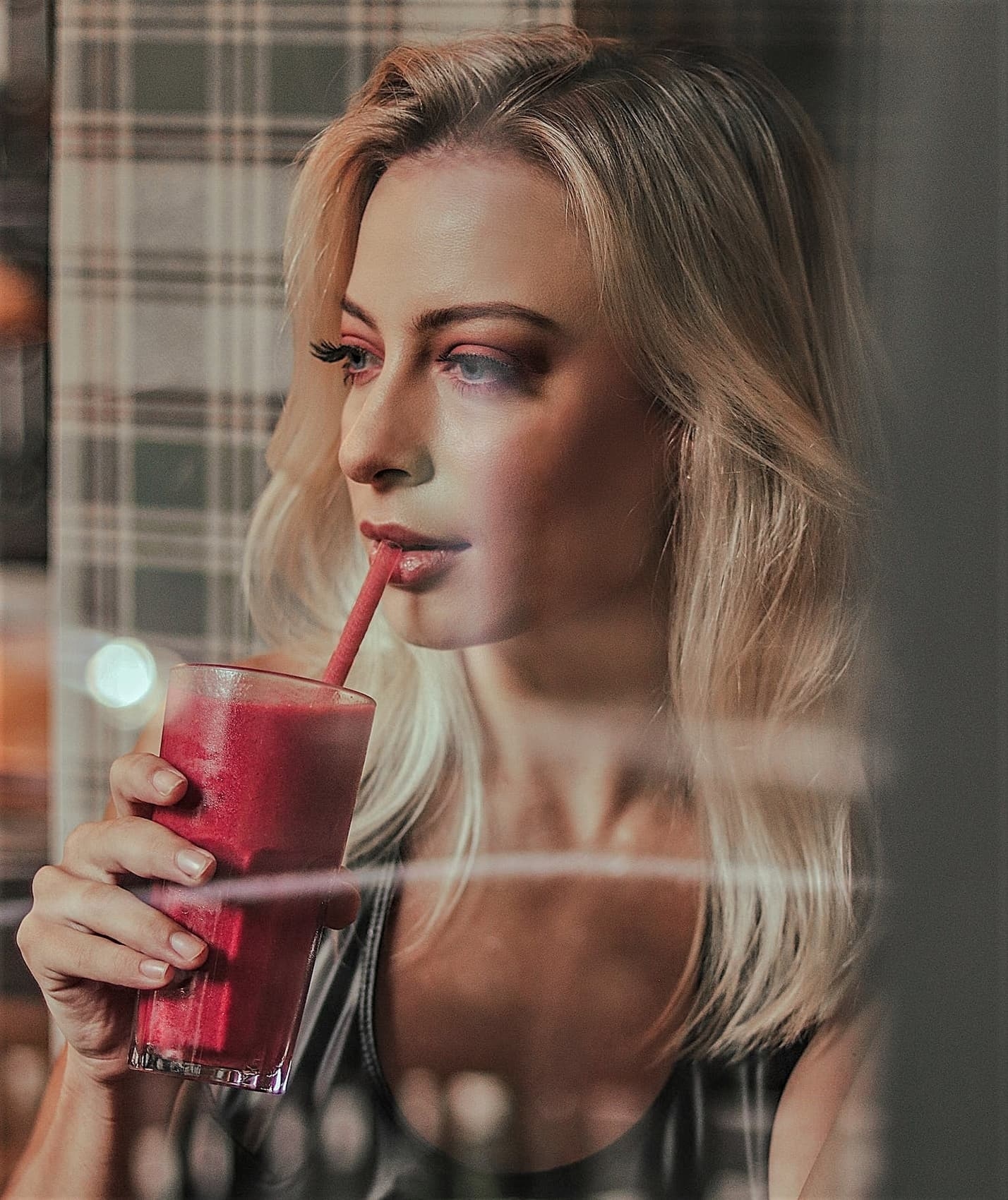 Woman drinking smoothie