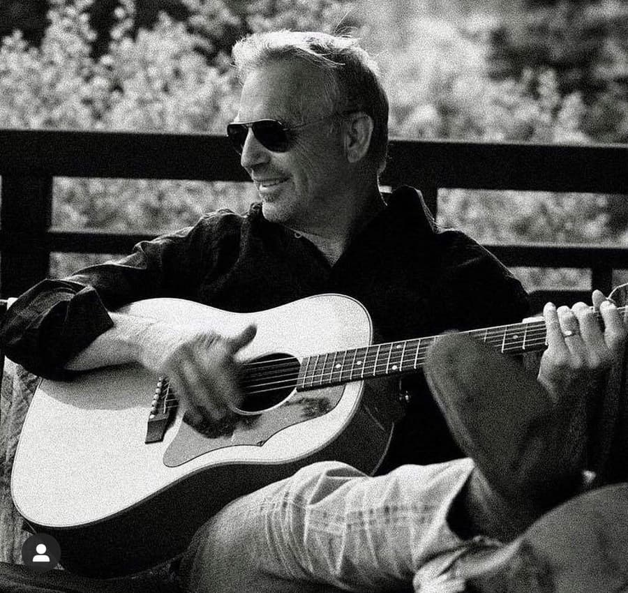 Kevin Costner with guitar
