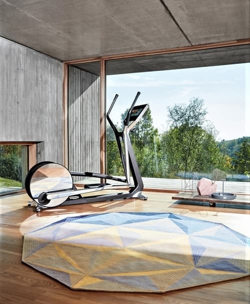 A great view is very inspiring and a good focal point for creating motivation in your exercise room. Photo Technogym.