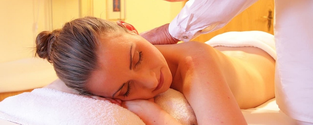 Woman getting massage at spa