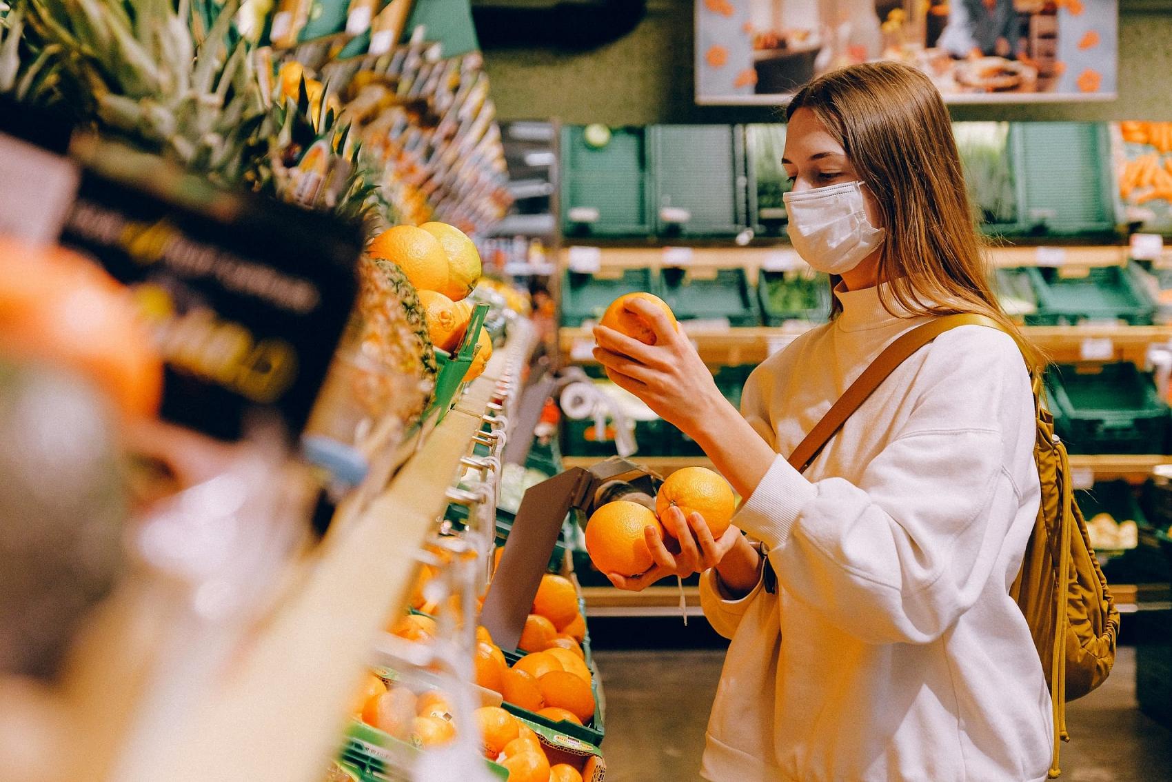 Woman with mask shopping